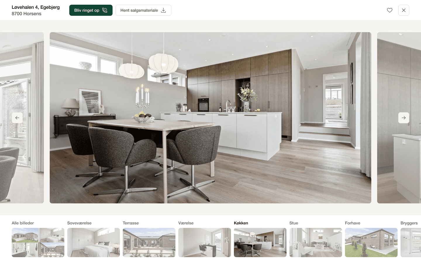 A full-screen photo viewer/gallery with room-by-room category thumbnails along the bottom