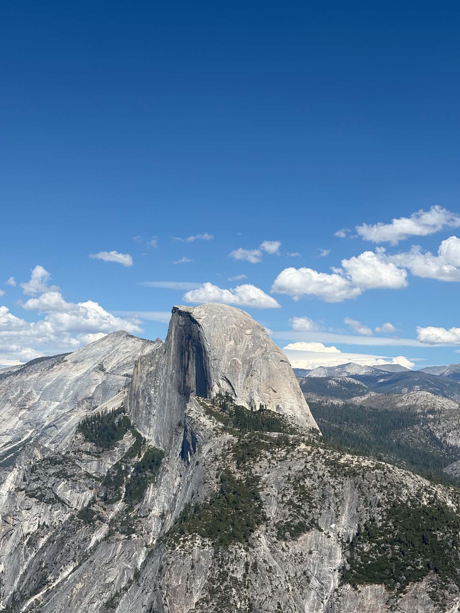 Half Dome in Yosemite under a clear blue sky